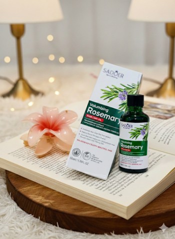 مقایسه روغن رزماری سادور و ماینوکسیدیل برای رشد مجدد مو روی کتاب
